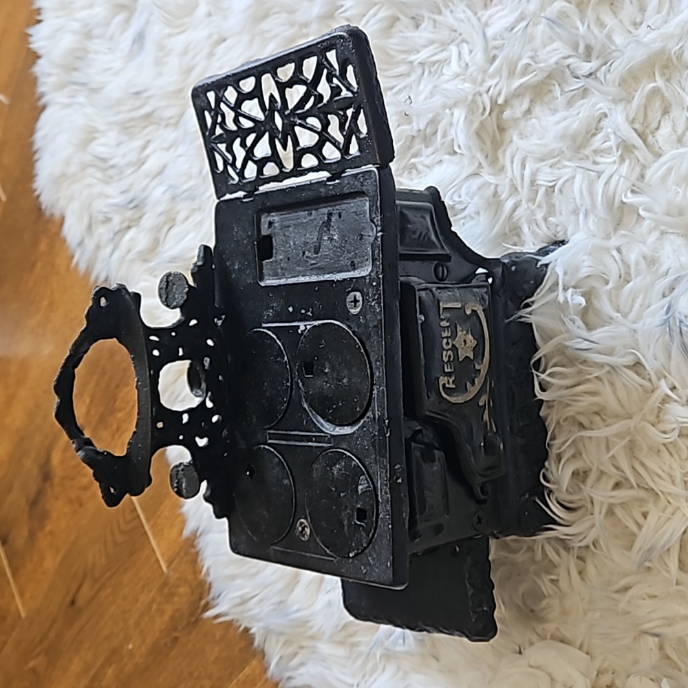 Vintage salesman model stove. Cast iron and tin